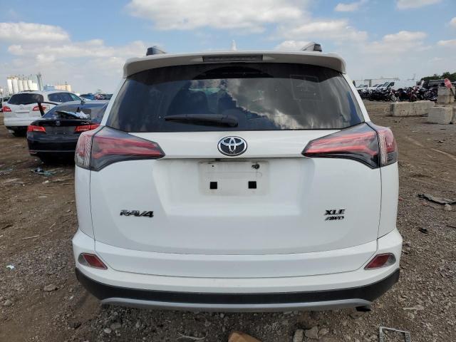 Photo 6 from auction – 2017 TOYOTA RAV4 XLE with VIN JTMRFREV6HD203901
