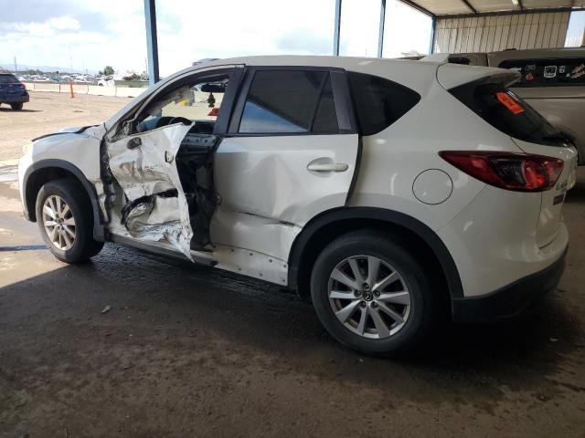 Photo 2 from auction – 2014 MAZDA CX-5 TOURI with VIN JM3KE4CY7E0403734