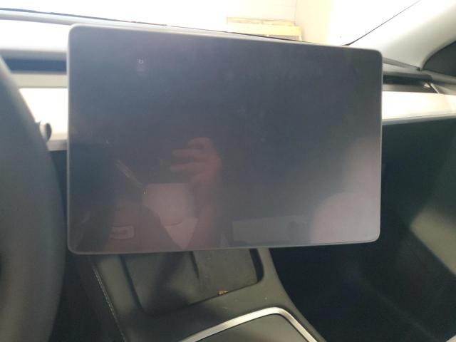 Photo 9 from auction – 2023 TESLA MODEL Y with VIN 7SAYGAEE7PF697030