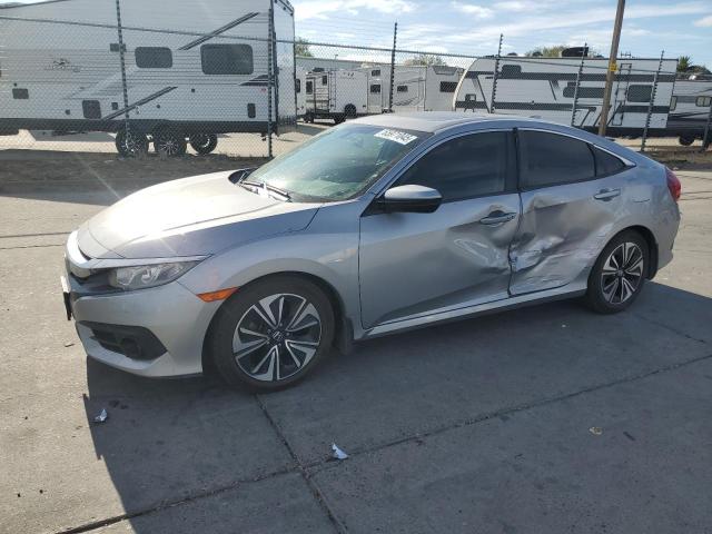 Photo 1 from auction – 2016 HONDA CIVIC EX with VIN 2HGFC1F39GH637811