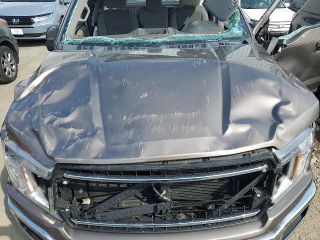Photo 11 from auction – 2018 FORD F150 with VIN 1FTMF1E54JKD77172