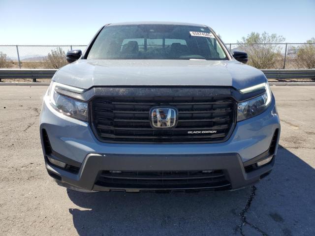 Photo 5 from auction – 2022 HONDA RIDGELINE with VIN 5FPYK3F8XNB032692