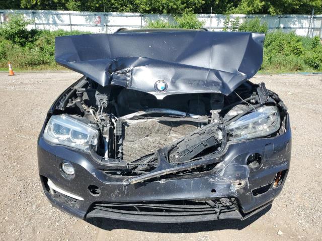 Photo 5 from auction – 2014 BMW X5 XDRIVE3 with VIN 5UXKR0C5XE0H23384