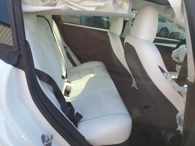 Photo 10 from auction – 2023 TESLA MODEL 3 with VIN 5YJ3E1EB6PF620720