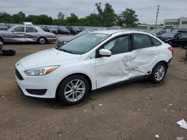 FORD FOCUS SE 2018 with VIN 1FADP3F20JL309173 - Photo from auction