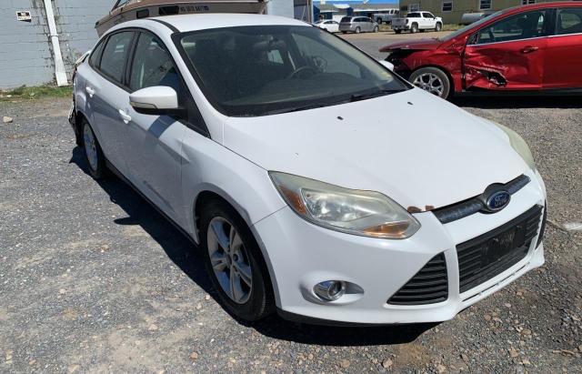 FORD FOCUS SE 2014 with VIN 1FADP3F21EL202851 - Photo from auction