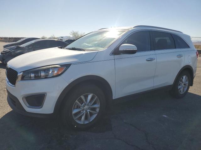 KIA SORENTO 2016 with VIN 5XYPG4A34GG074696 - Photo from auction