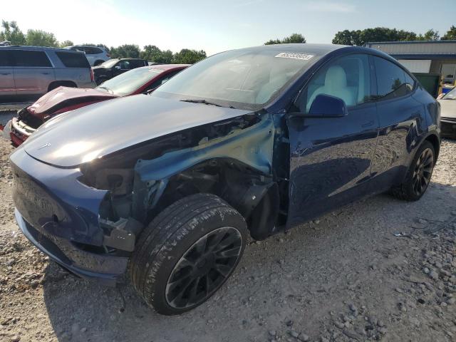 TESLA MODEL Y 2024 with VIN 7SAYGAEE7RF981874 - Photo from auction