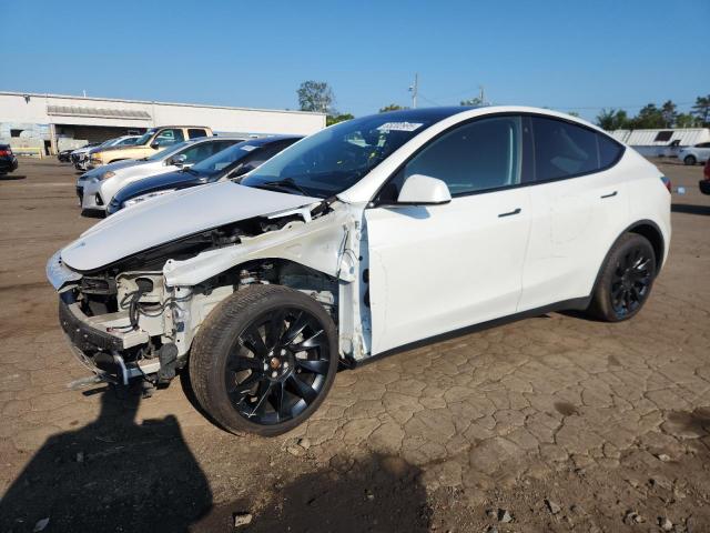 TESLA MODEL Y 2022 with VIN 7SAYGAEE4NF430845 - Photo from auction