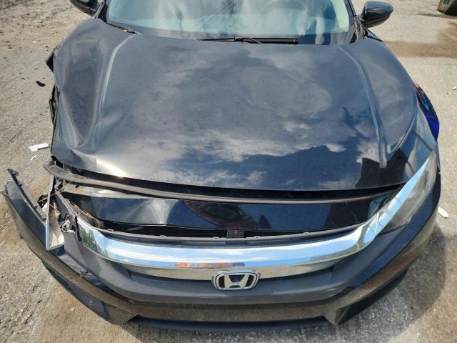 Photo 11 from auction – 2018 HONDA CIVIC LX with VIN 2HGFC2F59JH605973