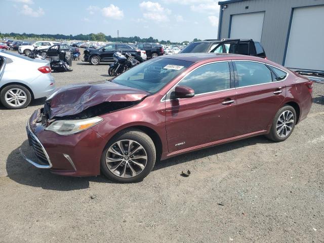 TOYOTA AVALON HYB 2016 with VIN 4T1BD1EB7GU051023 - Photo from auction