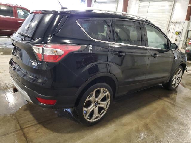 Photo 3 from auction – 2017 FORD ESCAPE TITANIUM with VIN 1FMCU9J92HUA64401