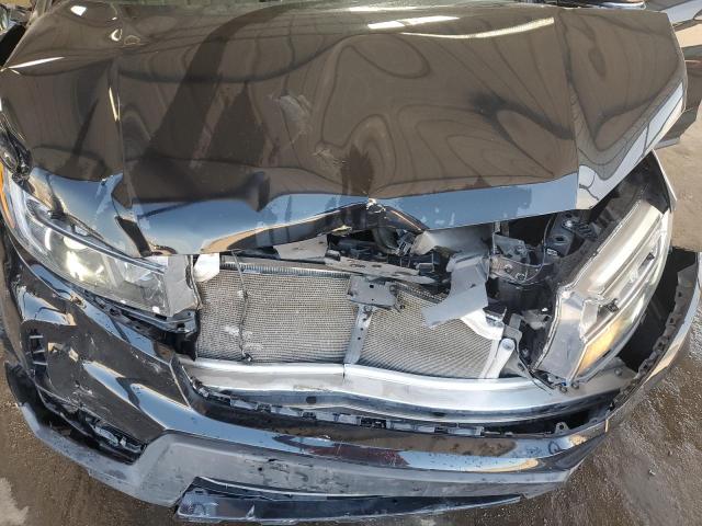 Photo 11 from auction – 2022 HONDA RIDGELINE with VIN 5FPYK3F89NB000154