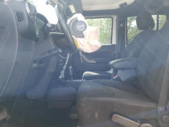 Photo 7 from auction – 2014 JEEP WRANGLER U with VIN 1C4BJWDG3EL157446