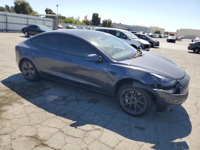 Photo 4 from auction – 2023 TESLA MODEL 3 with VIN 5YJ3E1EA3PF590342