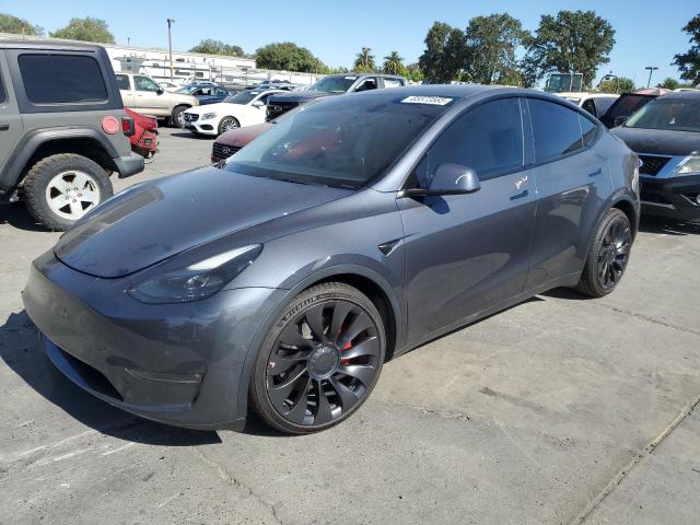TESLA MODEL Y 2022 with VIN 7SAYGDEF0NF562978 - Photo from auction