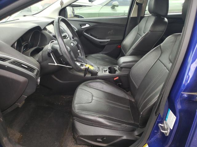 Photo 7 from auction – 2014 FORD FOCUS TITANIUM with VIN 1FADP3N20EL320245