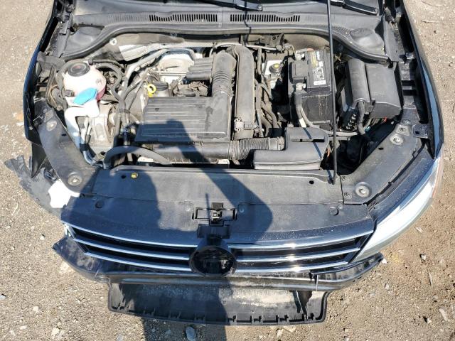 Photo 11 from auction – 2018 VOLKSWAGEN JETTA S with VIN 3VW2B7AJ8JM207380