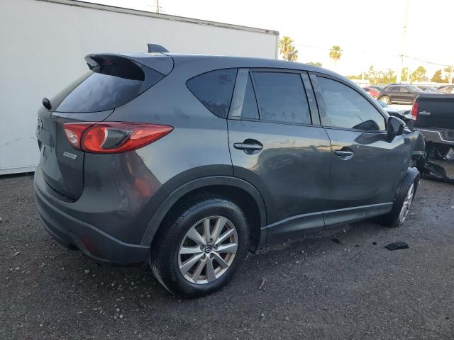 Photo 3 from auction – 2015 MAZDA CX-5 TOURI with VIN JM3KE2CY4F0472225
