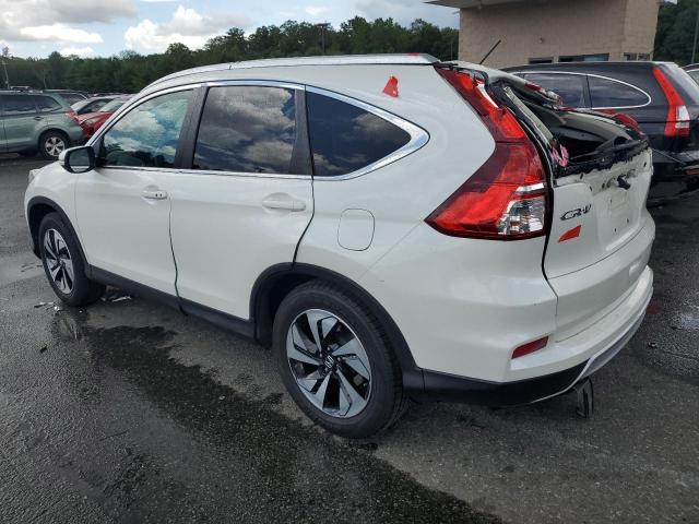 Photo 2 from auction – 2015 HONDA CR-V TOURI with VIN 5J6RM4H91FL073675