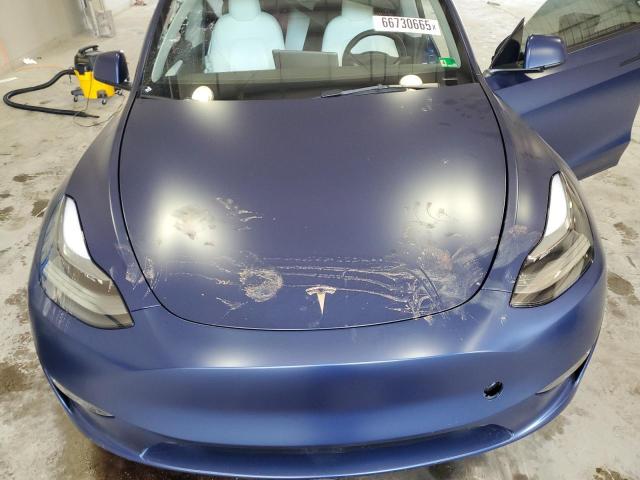 Photo 12 from auction – 2023 TESLA MODEL Y with VIN 7SAYGAEE7PF697030