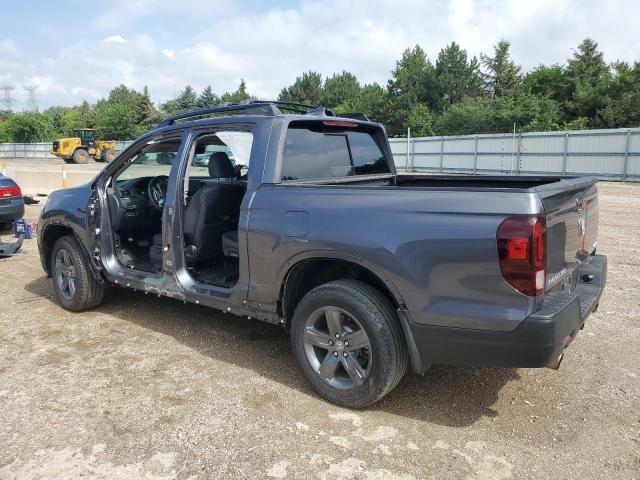 Photo 2 from auction – 2023 HONDA RIDGELINE with VIN 5FPYK3F56PB012044