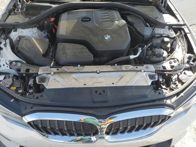 Photo 11 from auction – 2021 BMW 330I with VIN 3MW5R1J04M8B91740
