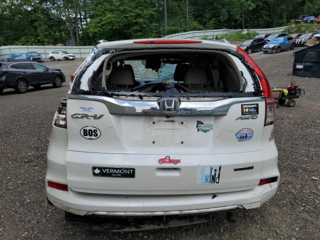 Photo 6 from auction – 2016 HONDA CR-V TOURI with VIN 5J6RM4H90GL014411