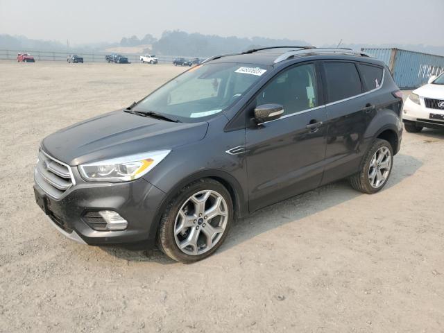 FORD ESCAPE TITANIUM 2017 with VIN 1FMCU9J91HUE55183 - Photo from auction