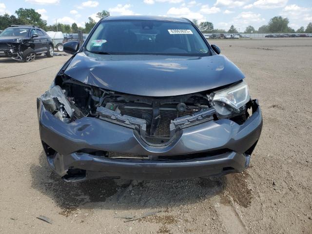 Photo 5 from auction – 2018 TOYOTA RAV4 LE with VIN JTMBFREV2JJ247743