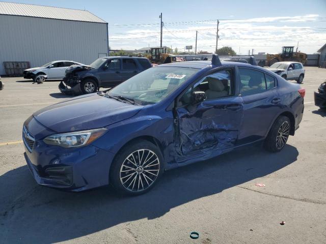 SUBARU IMPREZA 2017 with VIN 4S3GKAA60H3601176 - Photo from auction