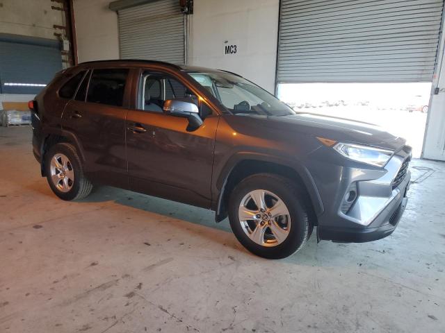 Photo 4 from auction – 2021 TOYOTA RAV4 XLE with VIN JTMW1RFV5MD064564
