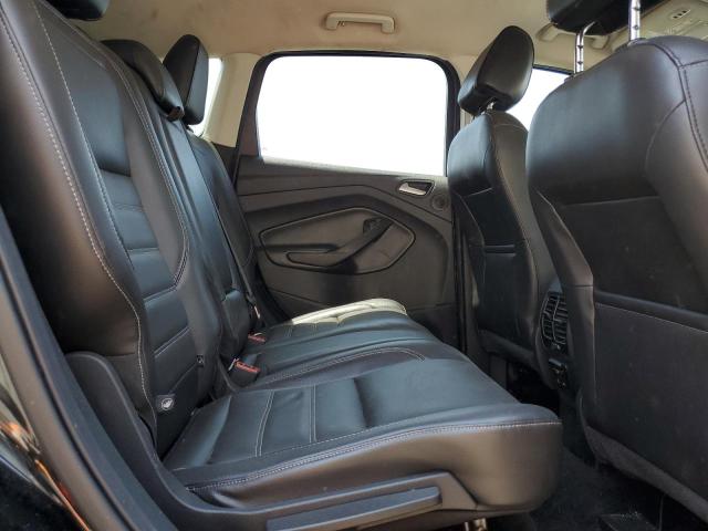 Photo 11 from auction – 2017 FORD ESCAPE TIT with VIN 1FMCU0J90HUE48236