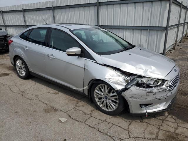 Photo 4 from auction – 2015 FORD FOCUS TITA with VIN 1FADP3J23FL280296