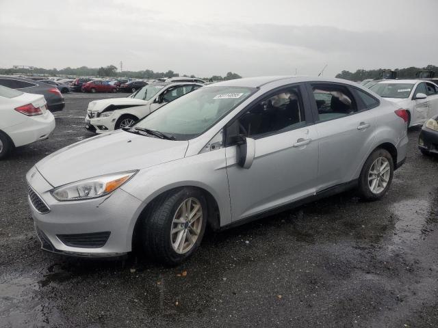 FORD FOCUS SE 2018 with VIN 1FADP3F24JL272919 - Photo from auction