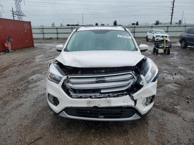 Photo 5 from auction – 2018 FORD ESCAPE SE with VIN 1FMCU9GD1JUB98950