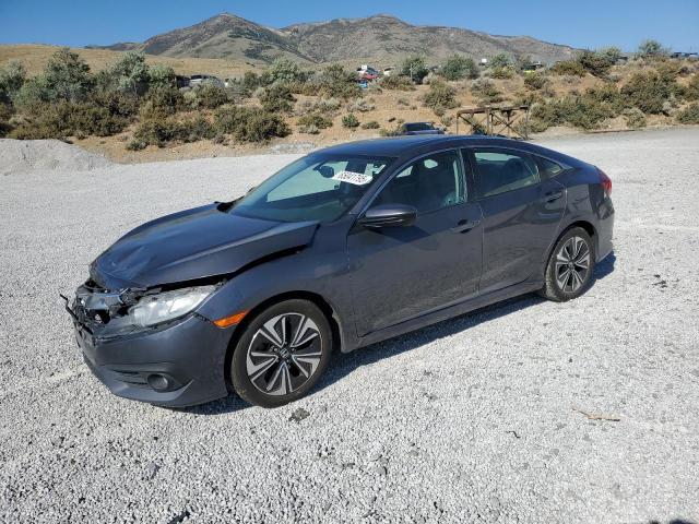 HONDA CIVIC EXL 2017 with VIN 2HGFC1F75HH631816 - Photo from auction