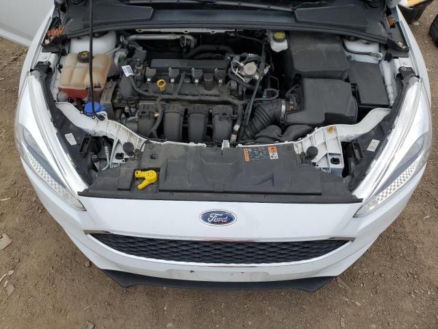 Photo 11 from auction – 2018 FORD FOCUS SE with VIN 1FADP3F20JL309173
