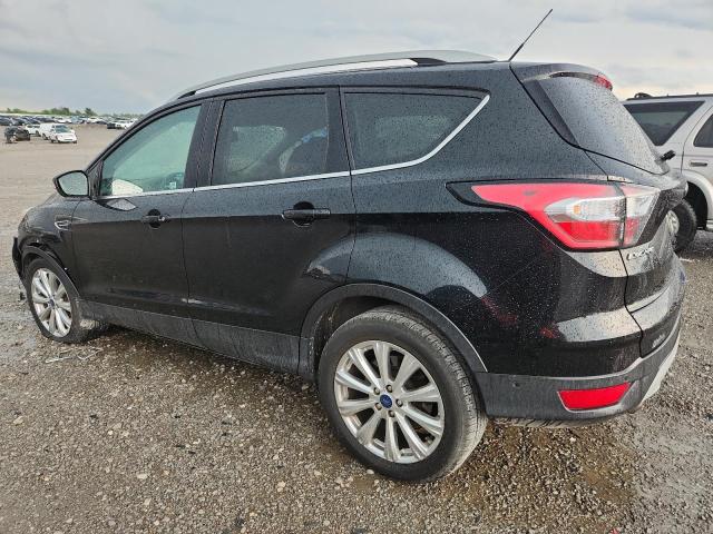 Photo 2 from auction – 2017 FORD ESCAPE TITANIUM with VIN 1FMCU0JD8HUA79310