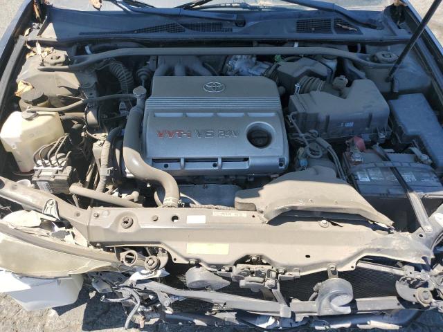 Photo 11 from auction – 2004 TOYOTA CAMRY LE with VIN 4T1BF30K54U077936