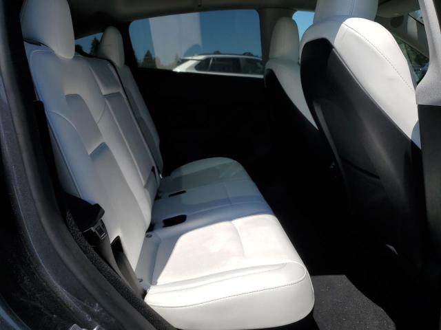 Photo 11 from auction – 2023 TESLA MODEL Y with VIN 7SAYGDEE7PF900094