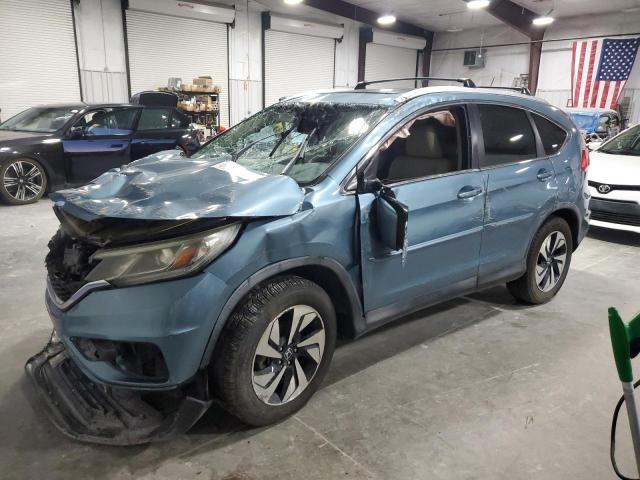 HONDA CR-V TOURI 2016 with VIN 5J6RM4H98GL074243 - Photo from auction