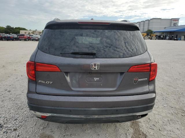 Photo 6 from auction – 2017 HONDA PILOT TOUR with VIN 5FNYF5H94HB011565
