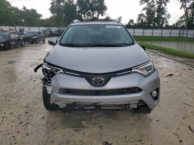 Photo 5 from auction – 2018 TOYOTA RAV4 LIMIT with VIN 2T3YFREV8JW450924