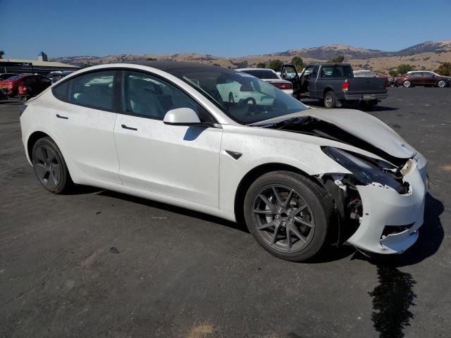 Photo 4 from auction – 2022 TESLA MODEL 3 with VIN 5YJ3E1EA0NF308882