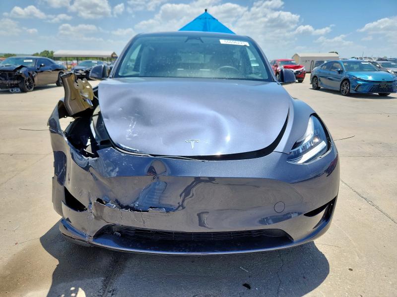 Photo 5 from auction – 2023 TESLA MODEL Y with VIN 7SAYGDEE2PA087874
