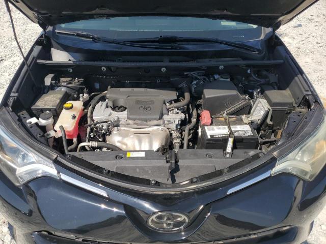 Photo 12 from auction – 2018 TOYOTA RAV4 LE with VIN 2T3ZFREV7JW461868