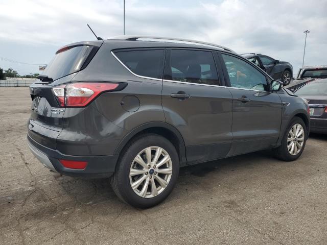 Photo 3 from auction – 2018 FORD ESCAPE with VIN 1FMCU9J91JUB30913