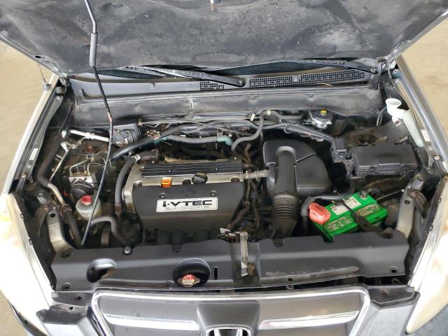 Photo 12 from auction – 2005 HONDA CR-V with VIN JHLRD68595C016480