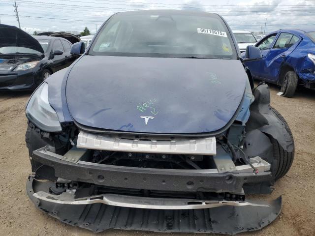 Photo 5 from auction – 2023 TESLA MODEL Y with VIN 7SAYGAEE2PF903614